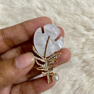Wing brooch