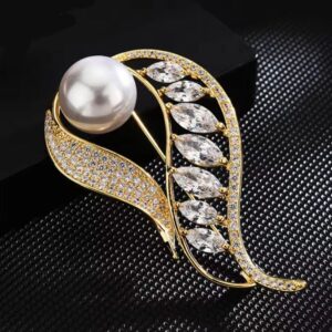 White stone brooch